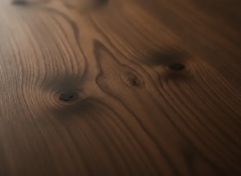 Close-up of rich walnut wood grain texture