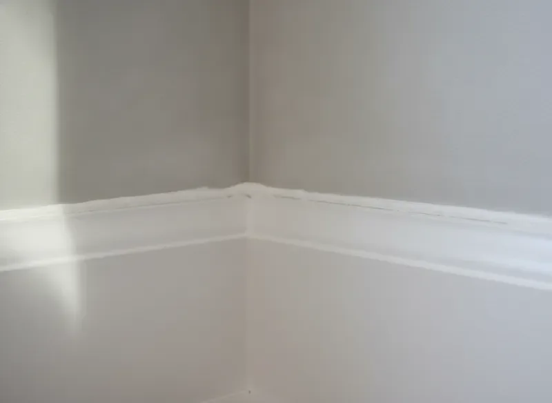 Crisp painted trim edge meeting wall surface